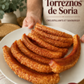 Un plat de torreznos dorés, croustillants et savoureux, prêts à être dégustés comme apéritif.