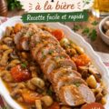 Un plat de filet de porc à la bière, prêt à être servi, avec une garniture colorée.
